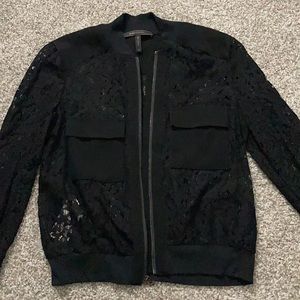 Brand new BcBg see thru sweater.